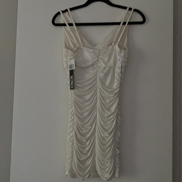 XOXO sleeveless ruched bodycon dress with lace details on the front. - Picture 6 of 8